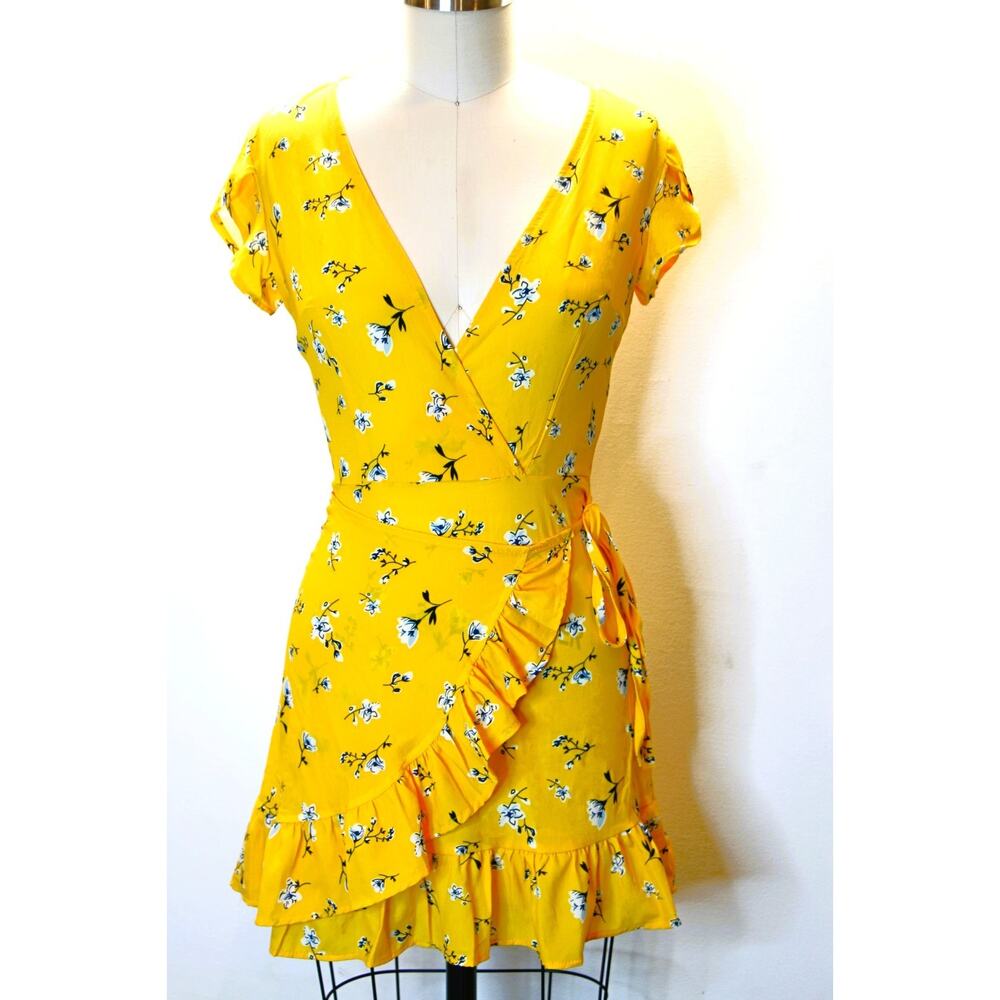 Show Lai Yellow Floral Wrap Dress – Size S – Ruffle Hem, V‑Neck, Tulip Sleeves